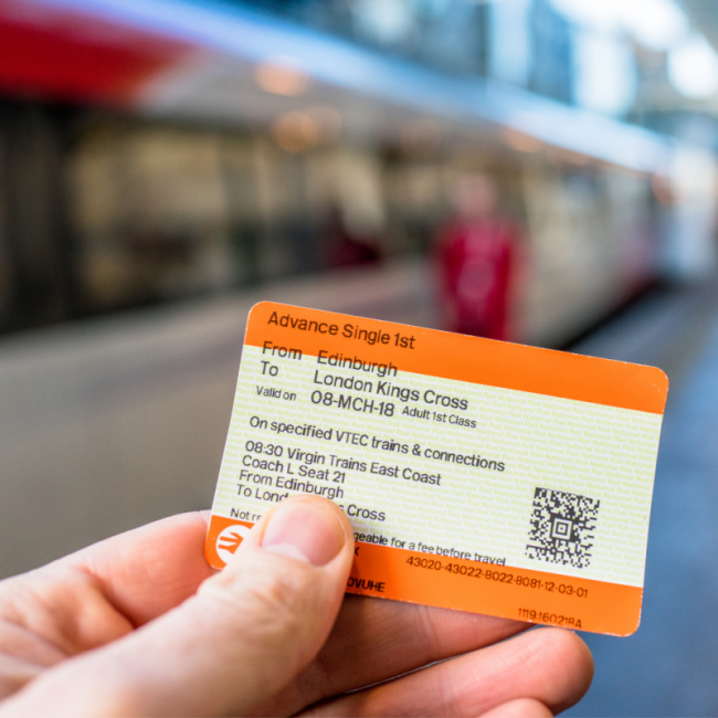 Person holding rail ticket