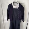 A child's cardigan, polo shirt and dress for school.